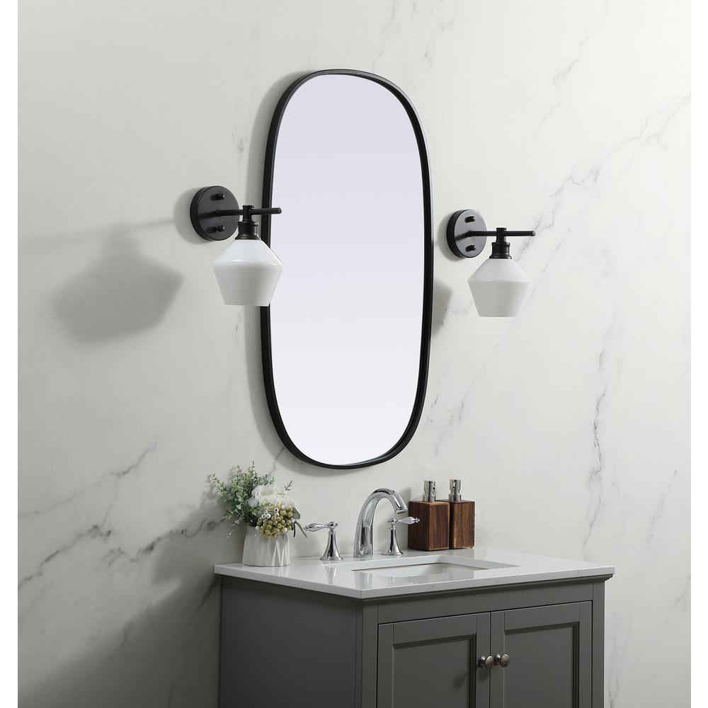 Metal Frame Oval Mirror 20x36 Inch in Black. Picture 2