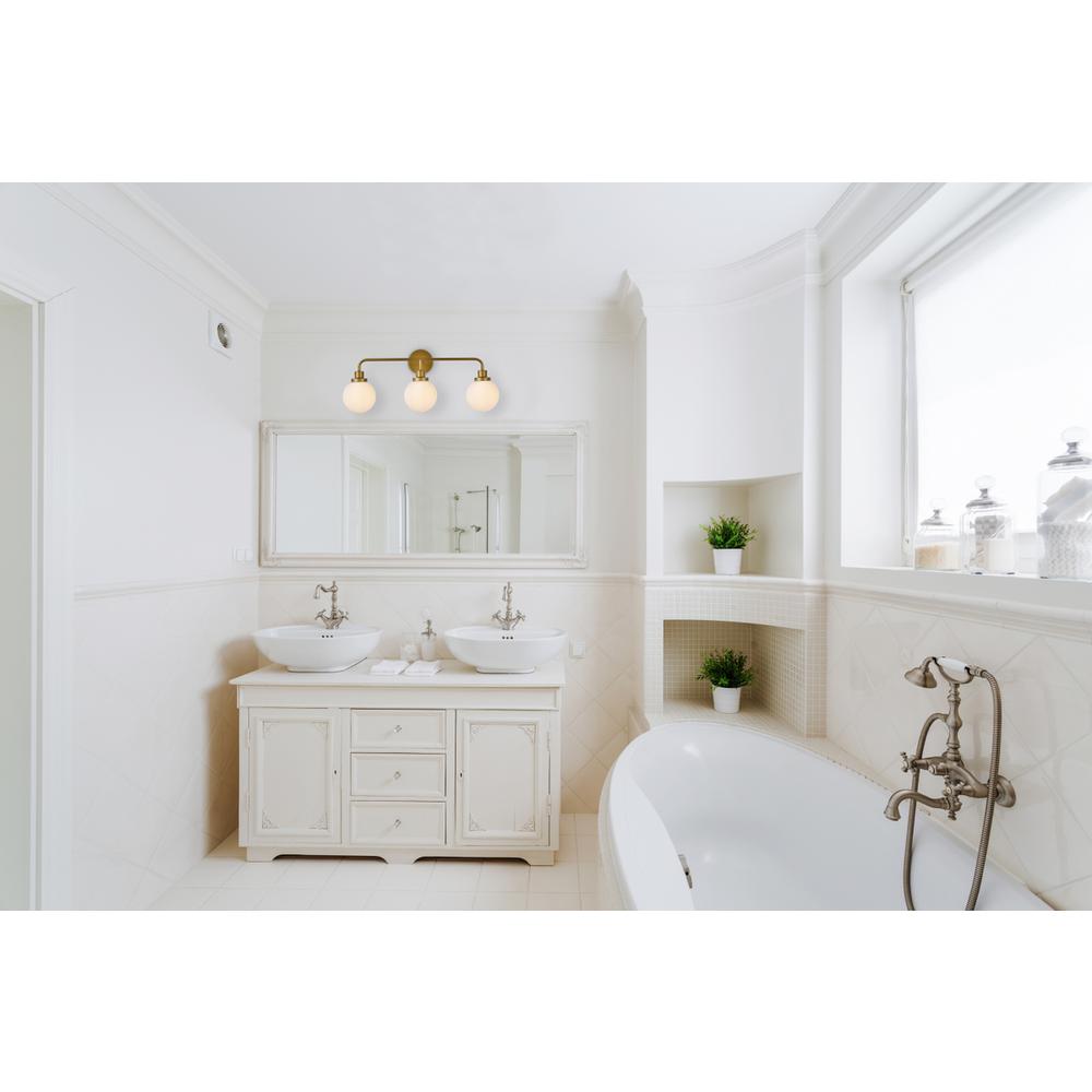 Hanson 3 lights bath sconce in brass with frosted shade. Picture 7