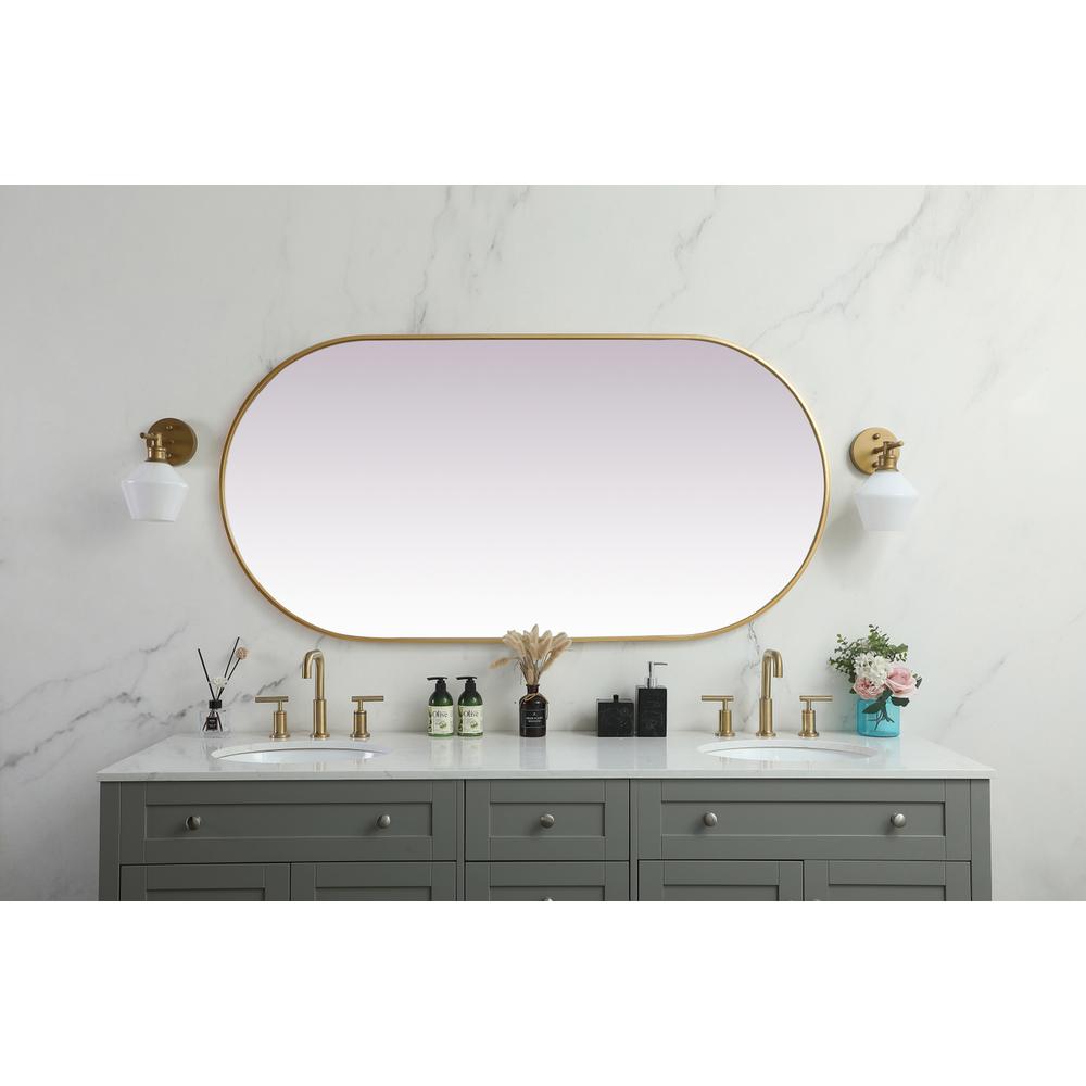 Metal Frame Oval Mirror 30x60 Inch in Brass. Picture 3