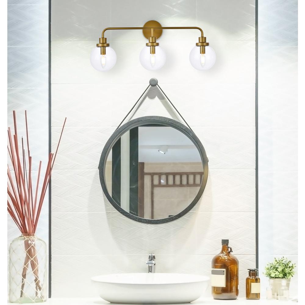 Hanson 3 lights bath sconce in brass with clear shade. Picture 6