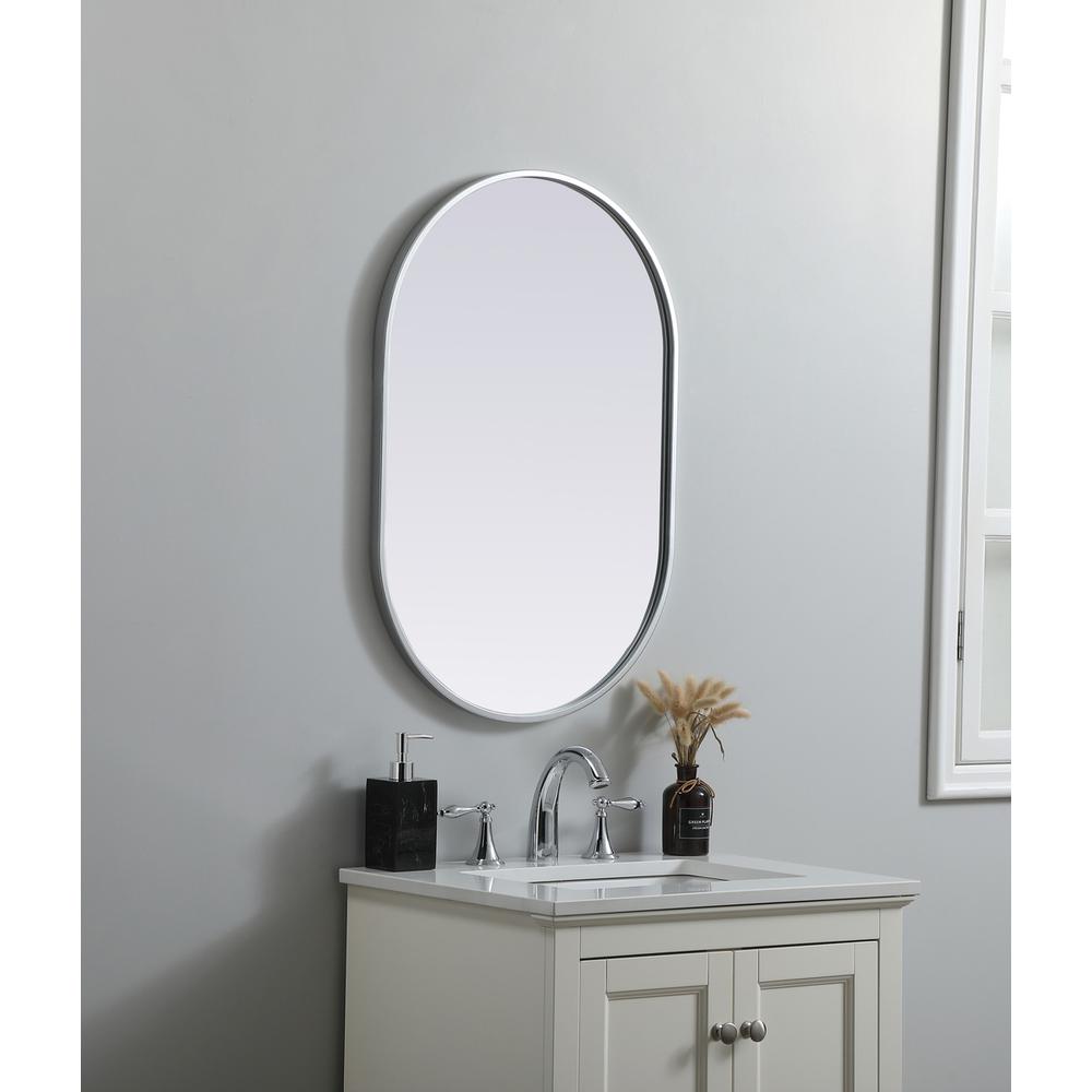 Metal Frame Oval Mirror 20x30 Inch in Silver. Picture 2