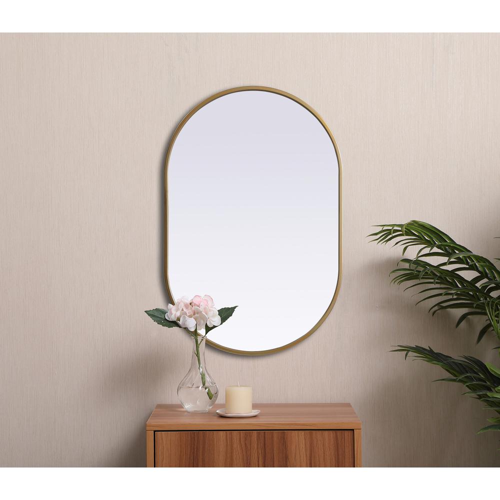Metal Frame Oval Mirror 20x30 Inch in Brass. Picture 3