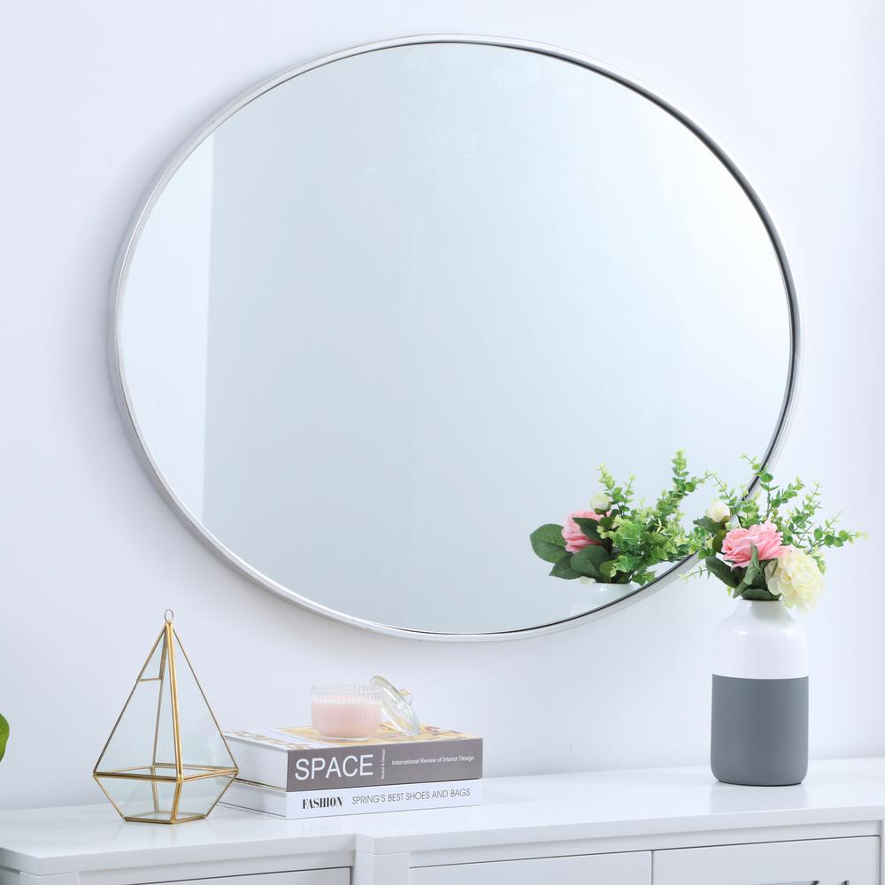 Metal frame oval mirror 40 inch in silver. Picture 7