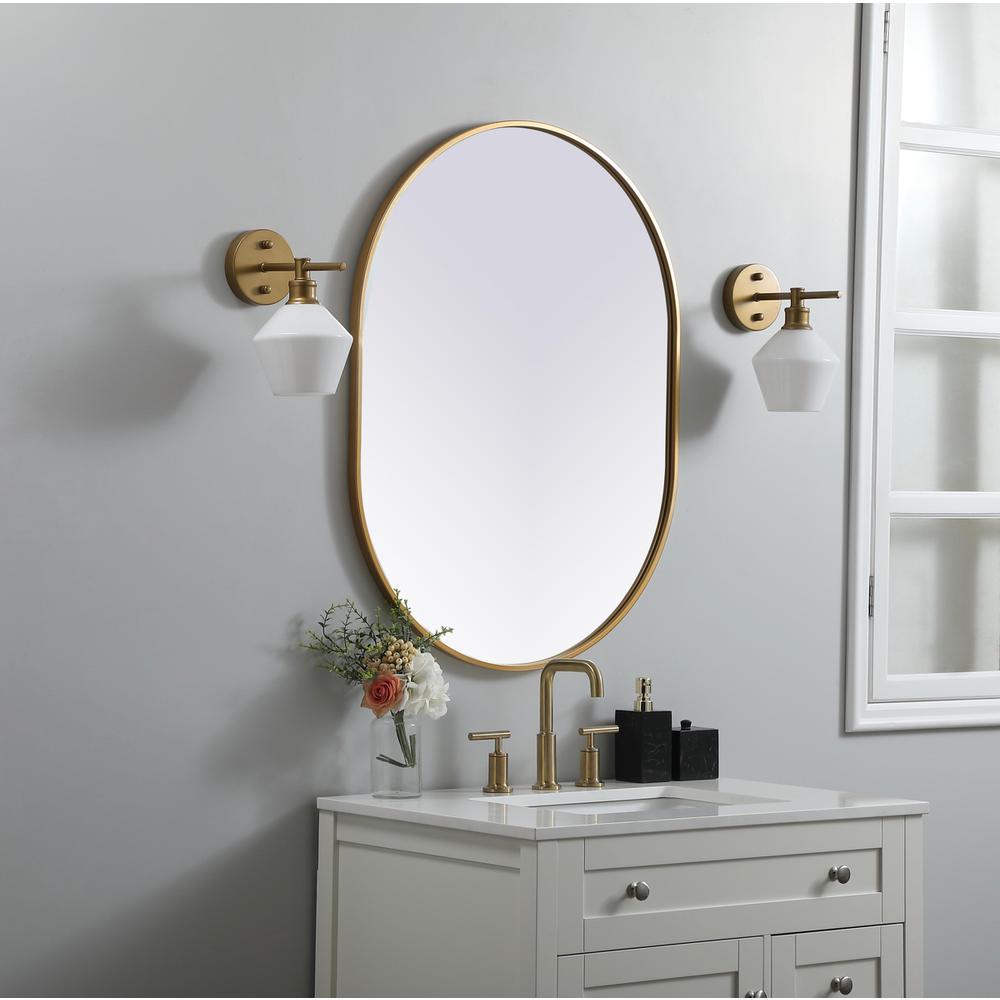 Metal Frame Oval Mirror 27x36 Inch in Brass. Picture 2