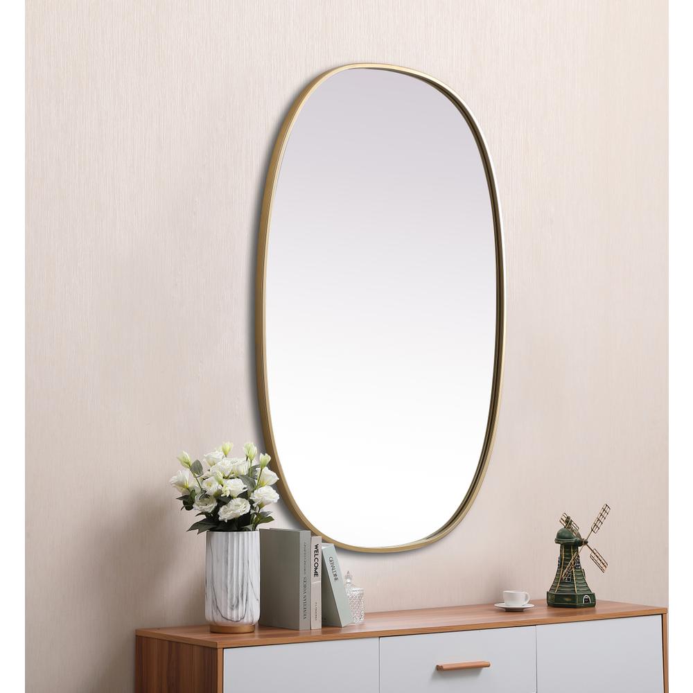 Metal Frame Oval Mirror 27x40 Inch in Brass. Picture 4