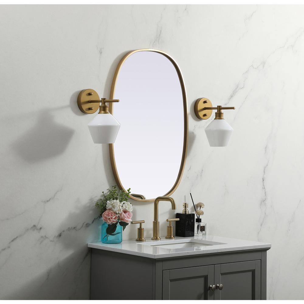 Metal Frame Oval Mirror 20x30 Inch in Brass. Picture 2