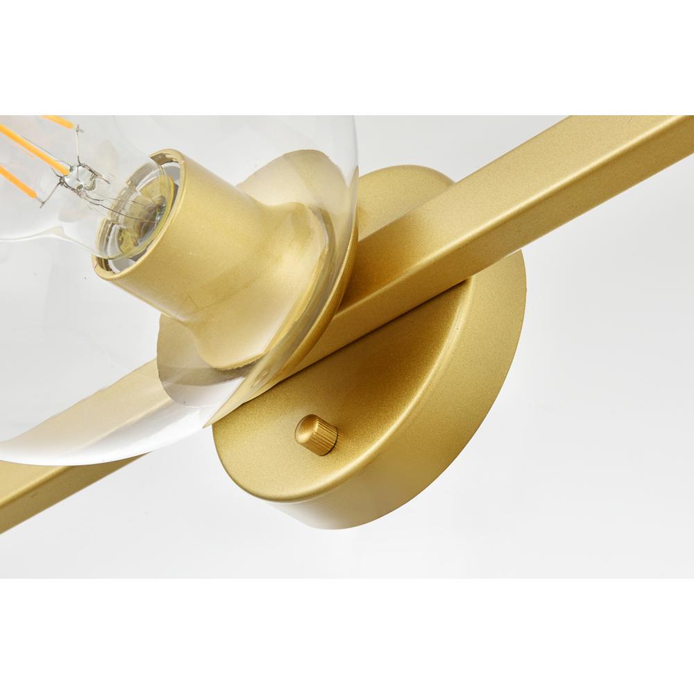 Rogelio 3 light Brass and Clear Bath Sconce. Picture 4