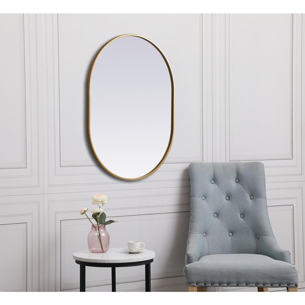 Metal Frame Oval Mirror 27x36 Inch in Brass. Picture 4