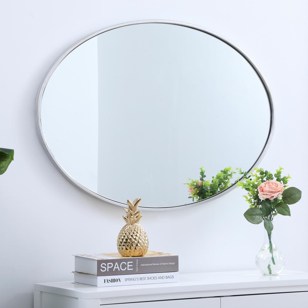 Metal frame oval mirror 34 inch in silver. Picture 7