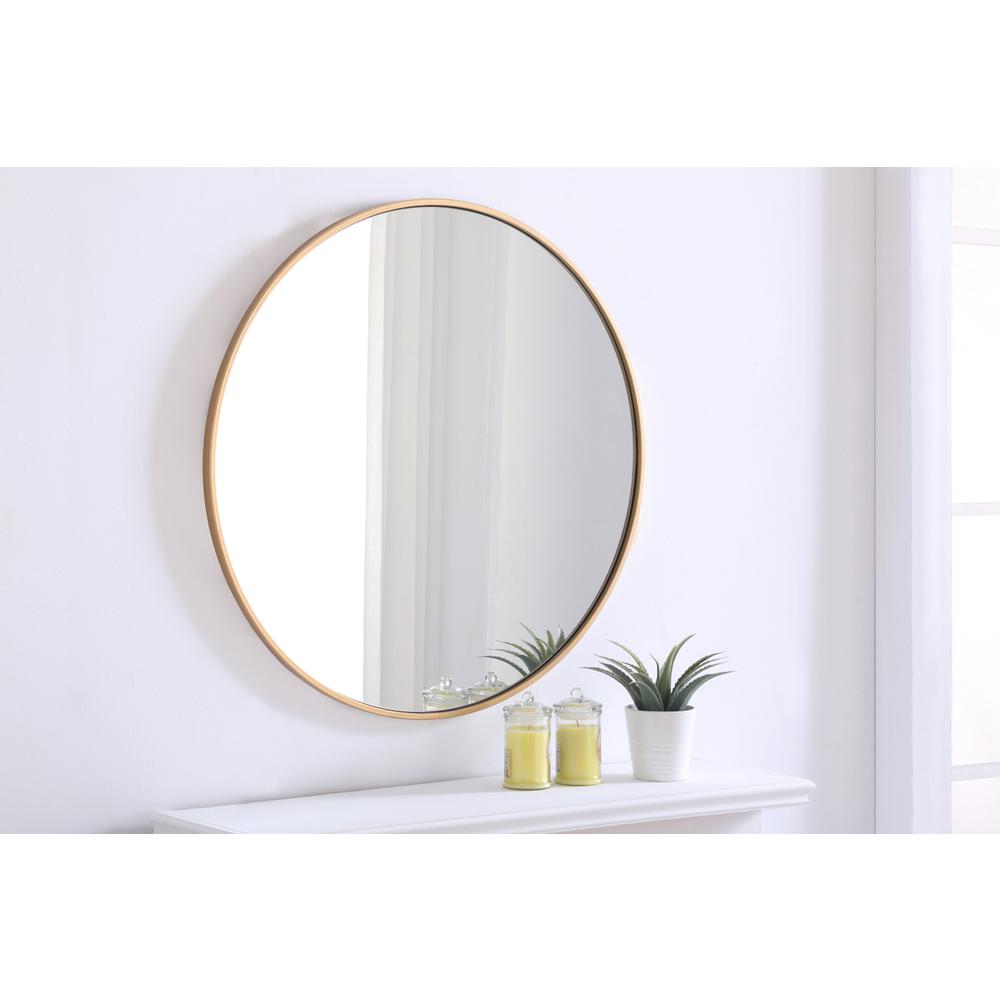 Metal frame Round Mirror 32 inch Brass finish. Picture 3