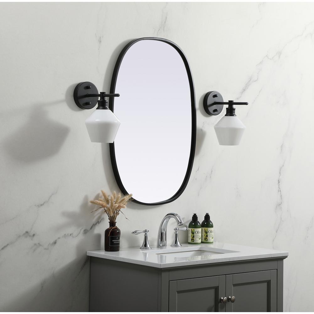 Metal Frame Oval Mirror 20x30 Inch in Black. Picture 2