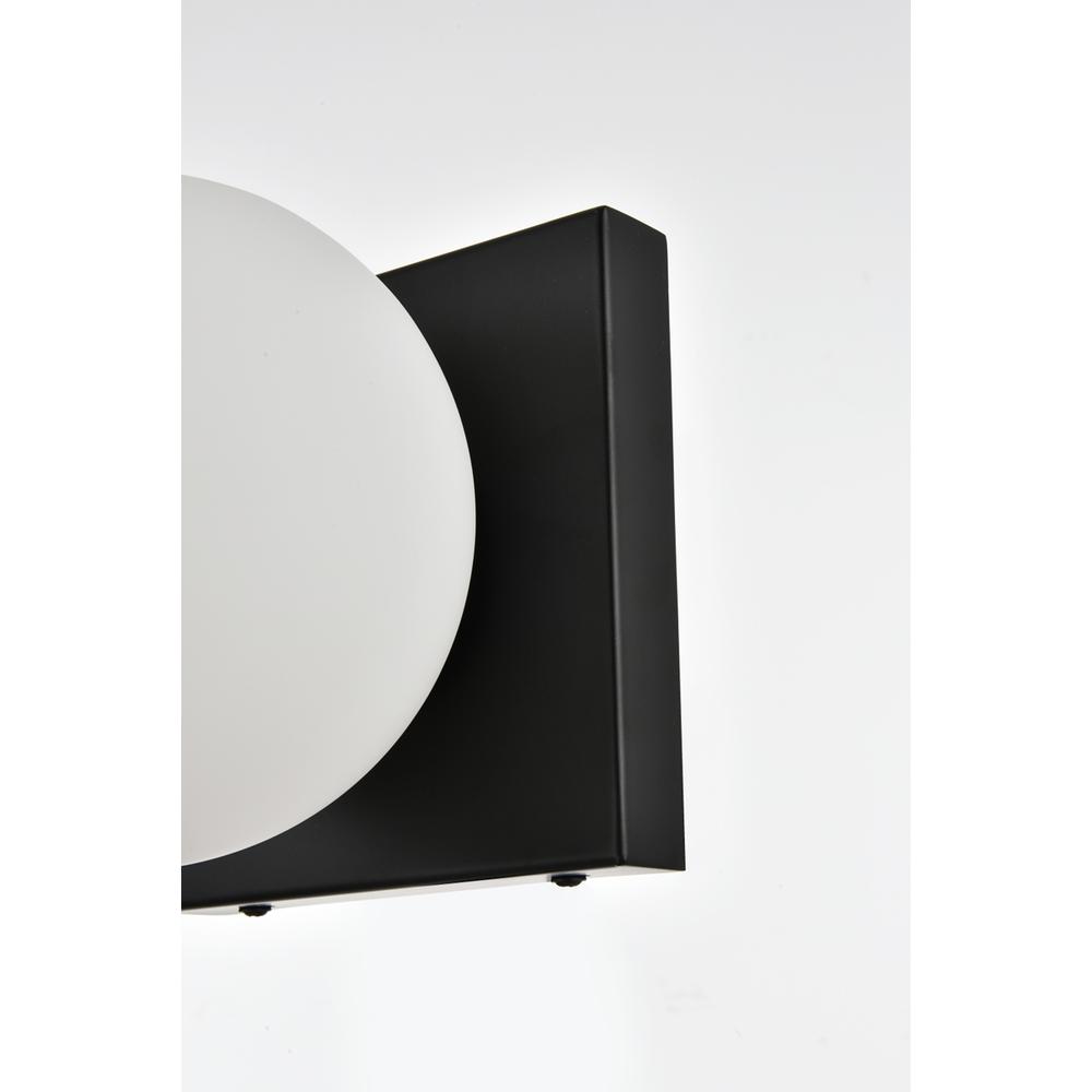 Jaylin 1 light Black and frosted white Bath Sconce. Picture 4