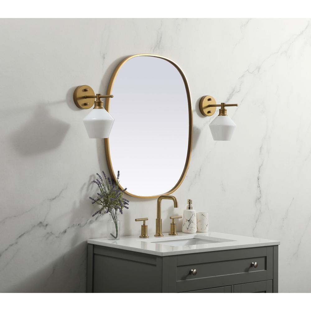 Metal Frame Oval Mirror 24x30 Inch in Brass. Picture 2