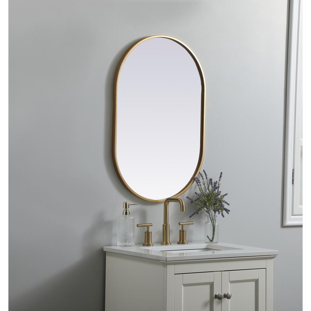 Metal Frame Oval Mirror 20x30 Inch in Brass. Picture 2
