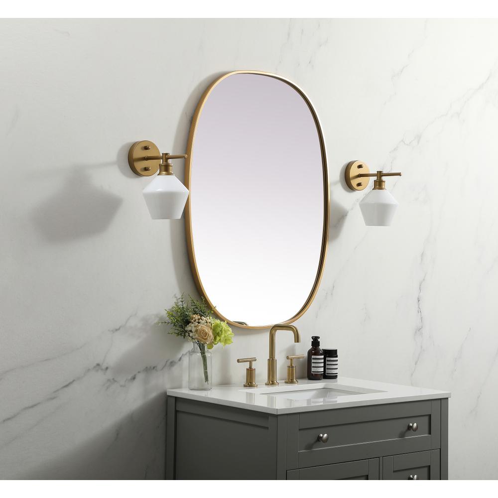 Metal Frame Oval Mirror 27x36 Inch in Brass. Picture 2