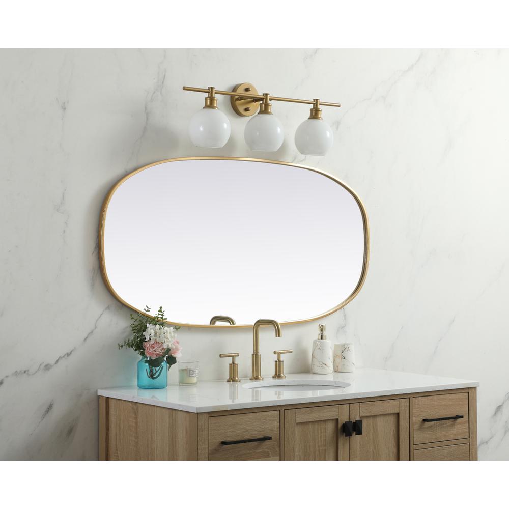 Metal Frame Oval Mirror 24x48 Inch in Brass. Picture 2