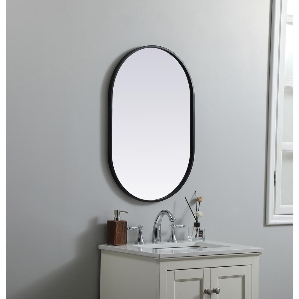 Metal Frame Oval Mirror 20x30 Inch in Black. Picture 2
