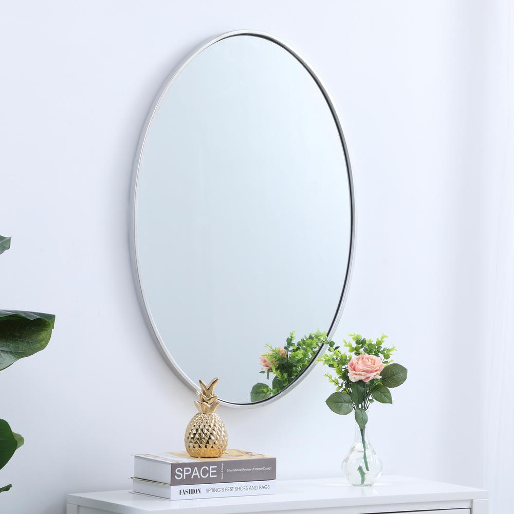 Metal frame oval mirror 34 inch in silver. Picture 2