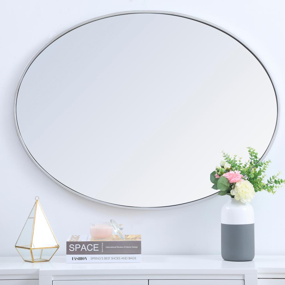 Metal frame oval mirror 40 inch in silver. Picture 6