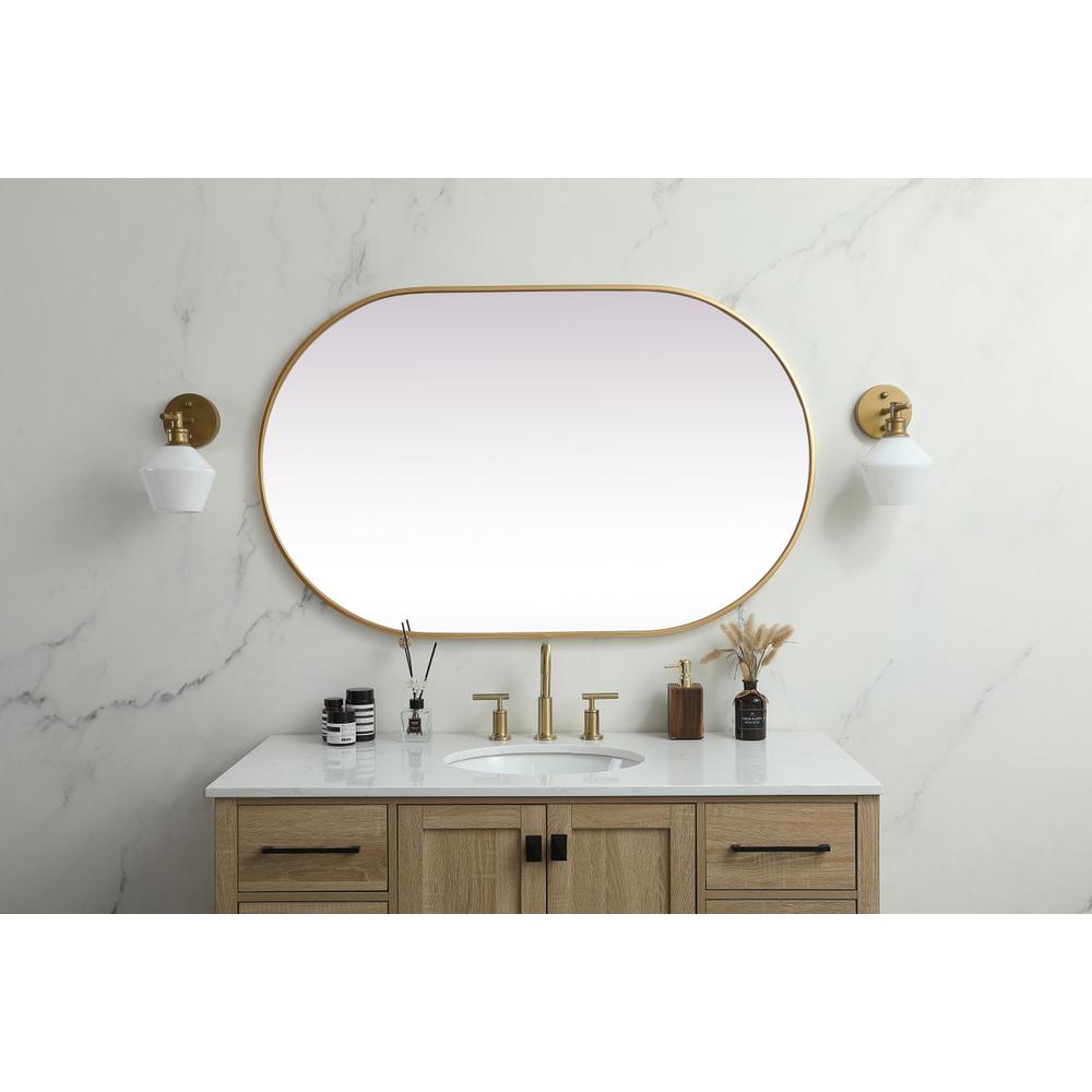 Metal Frame Oval Mirror 30x48 Inch in Brass. Picture 11