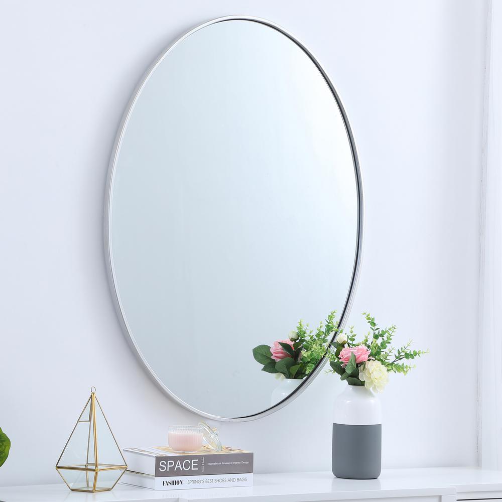 Metal frame oval mirror 40 inch in silver. Picture 2