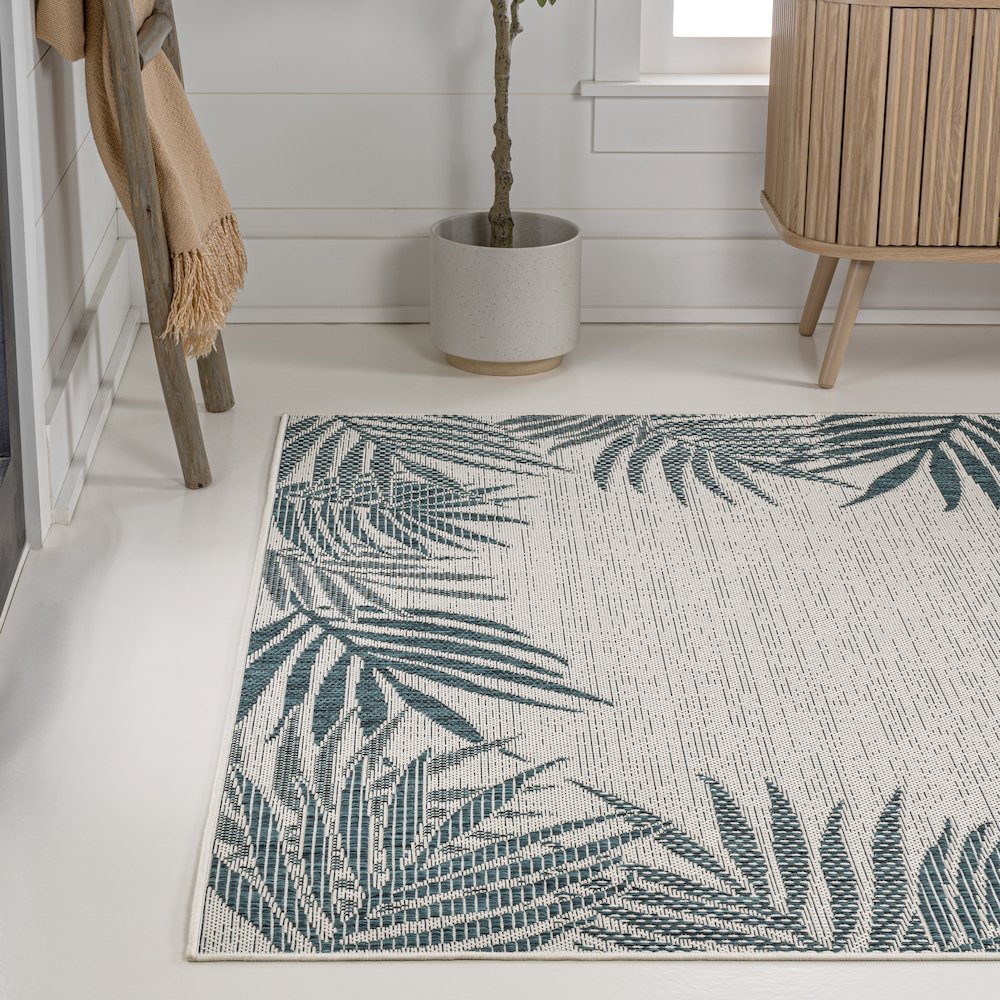 Isla Coastal Cottage Palm Frond Border Indoor/Outdoor Area Rug. Picture 1