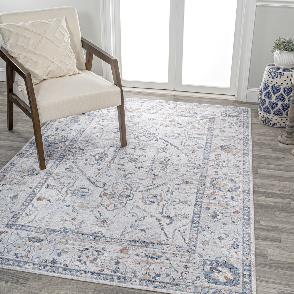 Brandy Rustic Border Low-Pile Machine-Washable Area Rug. Picture 1