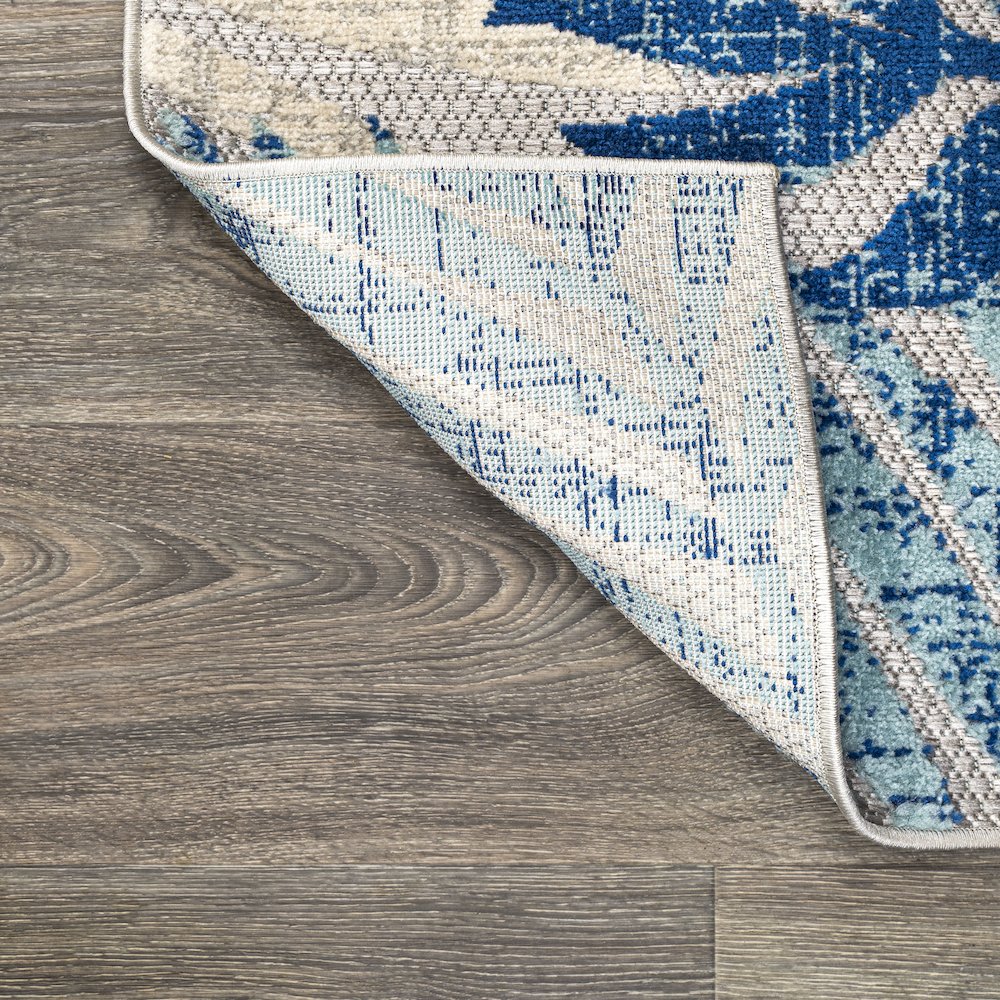 Tropics Palm Leaves Indoor/Outdoor Area Rug. Picture 9