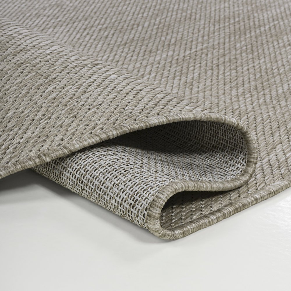 Evan Modern Rustic Organic CurveIndoor/Outdoor Shaped  Rug. Picture 3