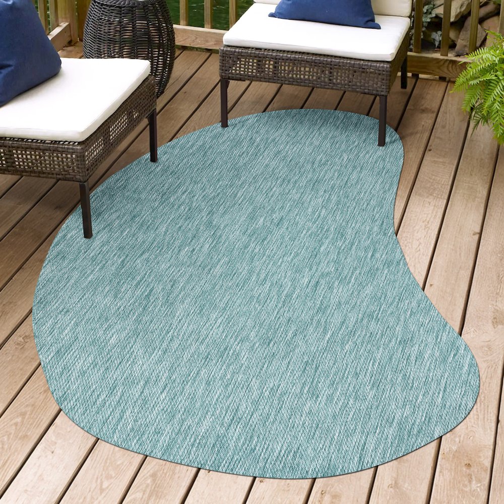 Evan Modern Rustic Organic CurveIndoor/Outdoor Shaped  Rug. Picture 1
