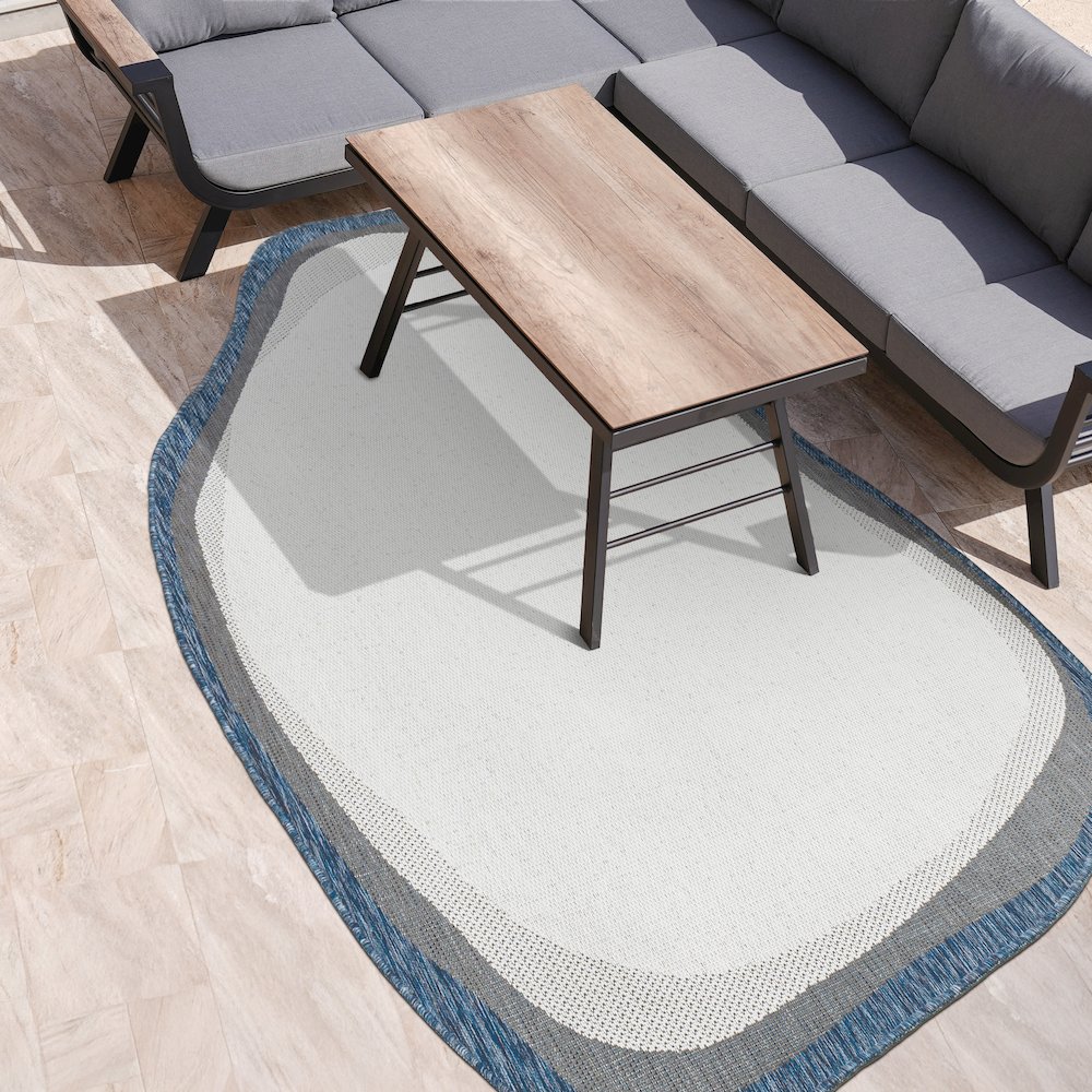 Cream/Navy 9 ft. x 12 ft. Indoor/Outdoor Shaped Area Rug. Picture 3