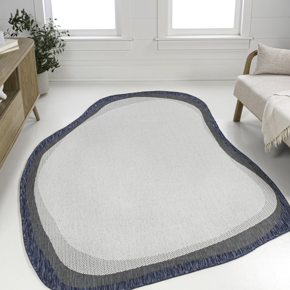 Cream/Navy 9 ft. x 12 ft. Indoor/Outdoor Shaped Area Rug. Picture 2