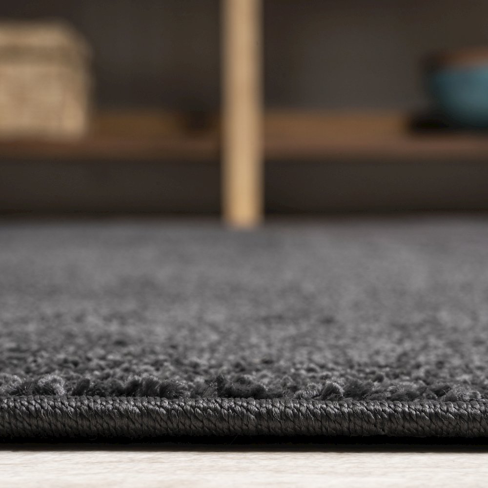 Haze Solid Low Pile Area Rug Black. Picture 8