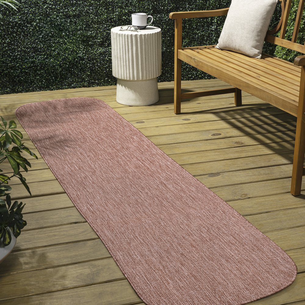 Radius Corner Solid Light Rose 2 ft. x 8 ft. Indoor/Outdoor Shaped Runner Rug. Picture 3