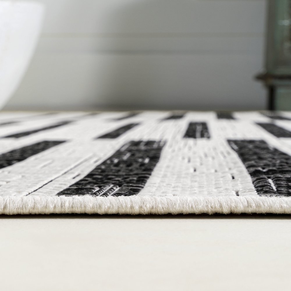 Sukie Modern Offset Stripe Indoor/Outdoor Area Rug. Picture 9