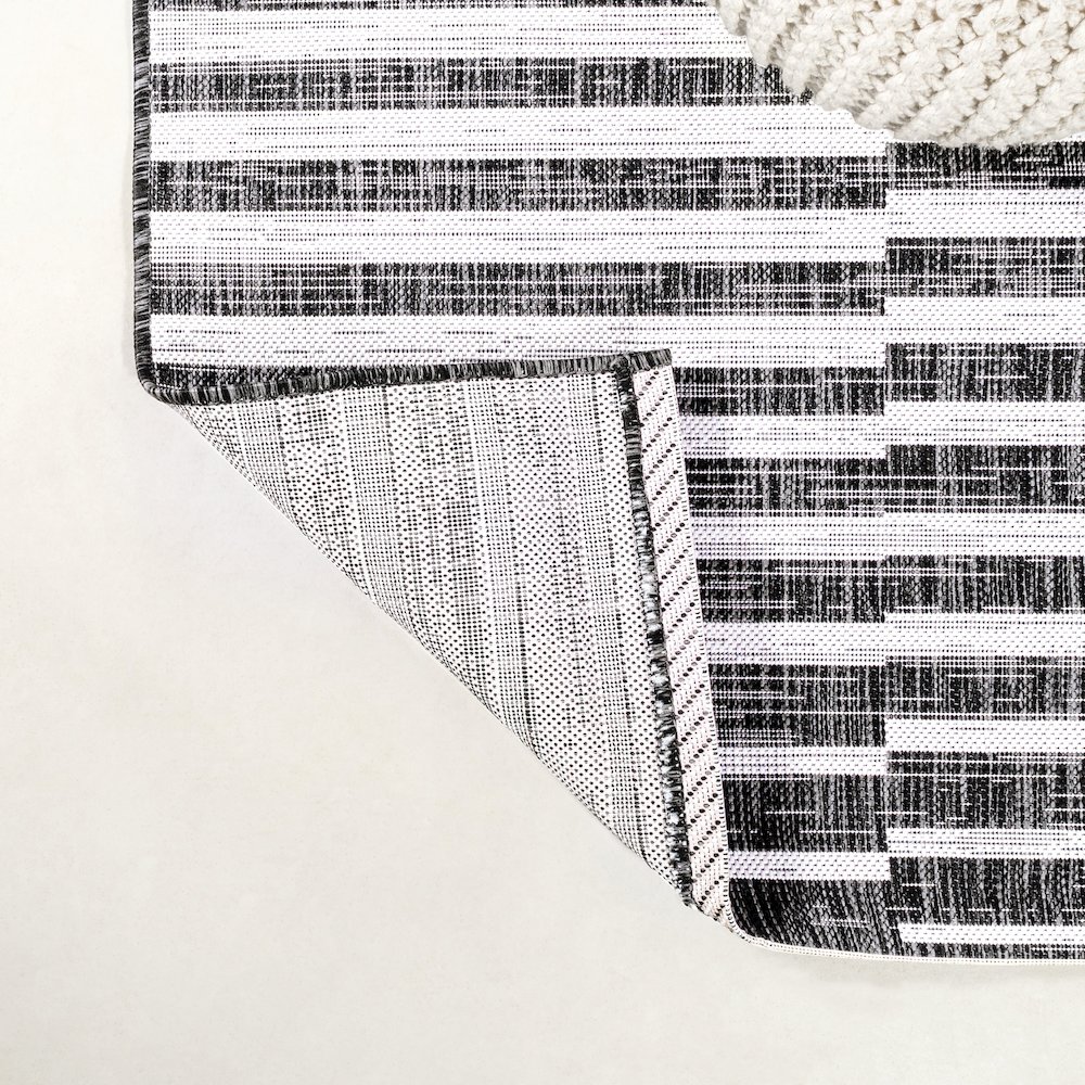Sukie Modern Offset Stripe Indoor/Outdoor Area Rug. Picture 3