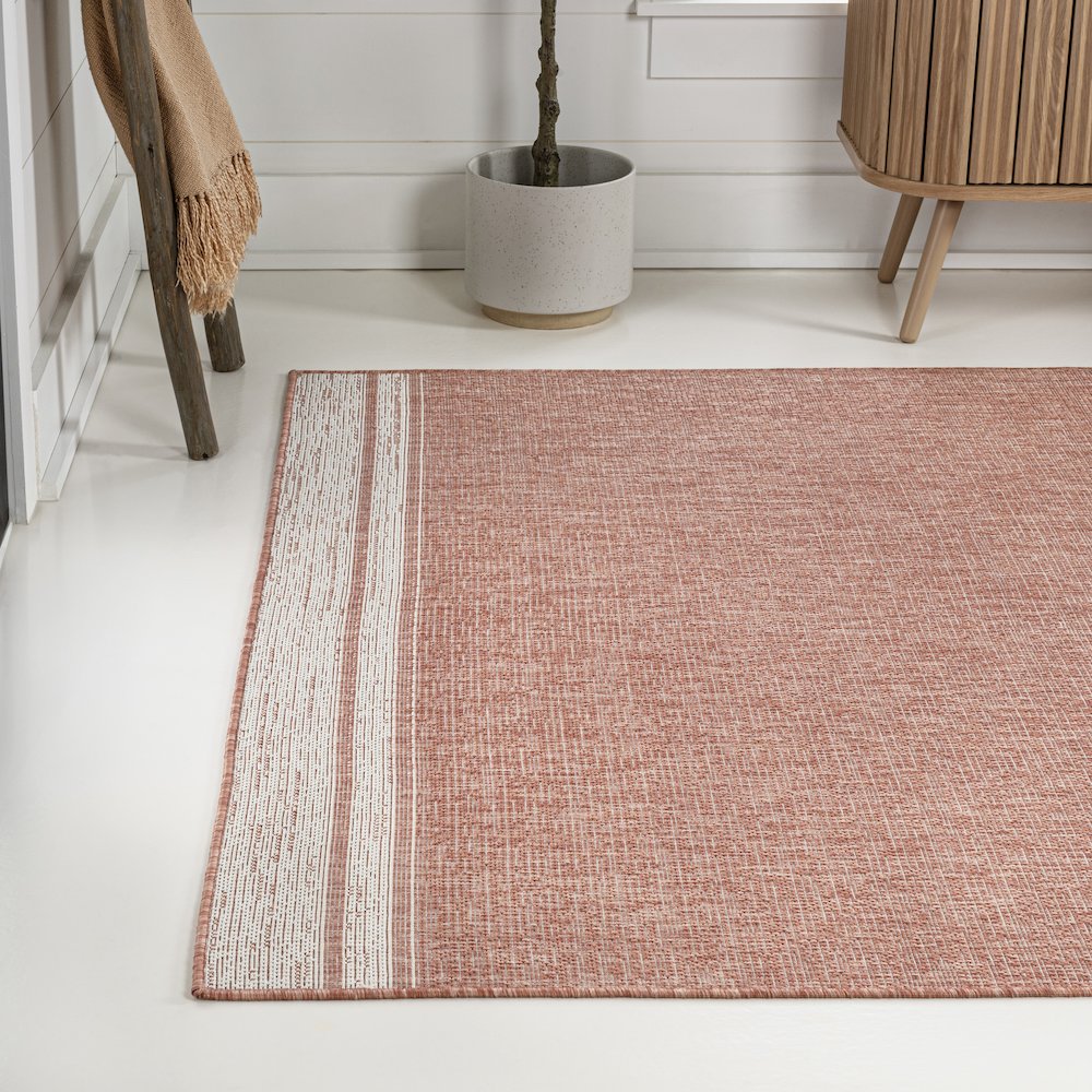 Alda Modern Minimalist Mingled Solid Indoor/Outdoor Area Rug. Picture 1