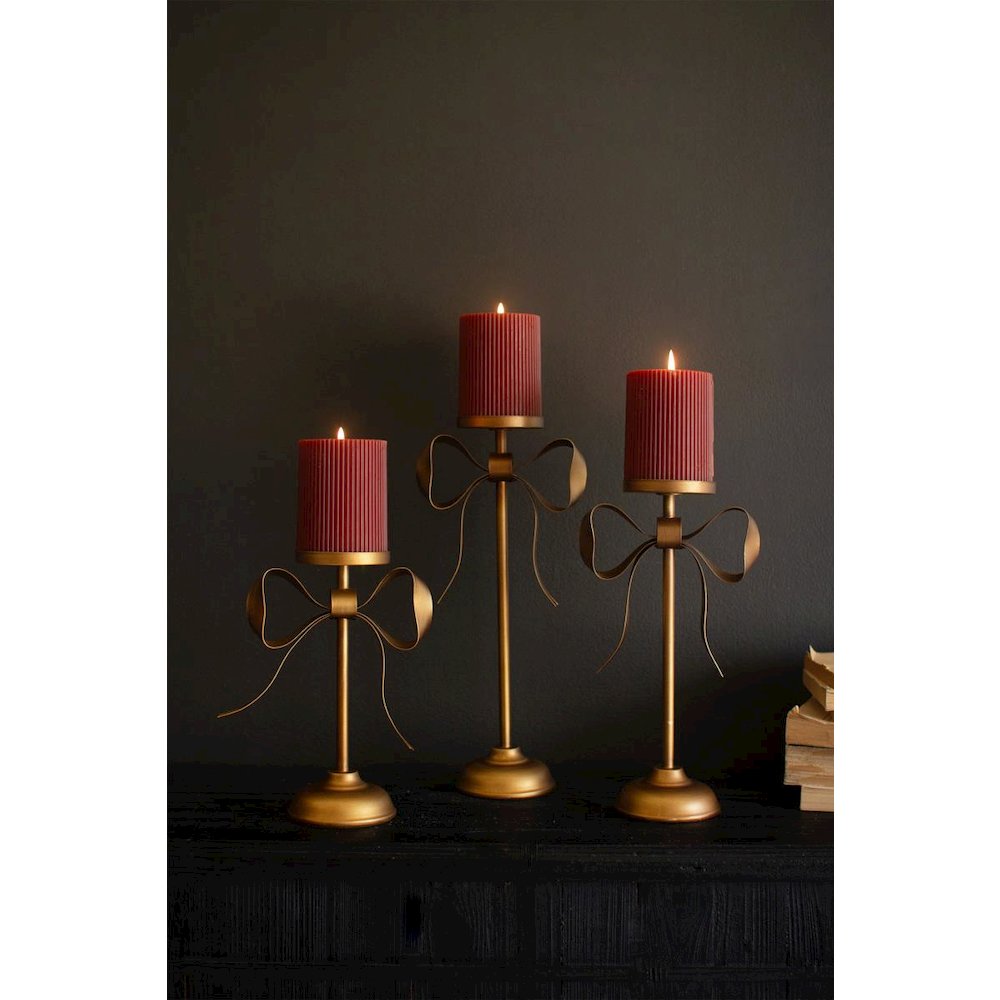 Set Of Three Antique Brass Pillar Candle Stands -Bow Detail. Picture 1