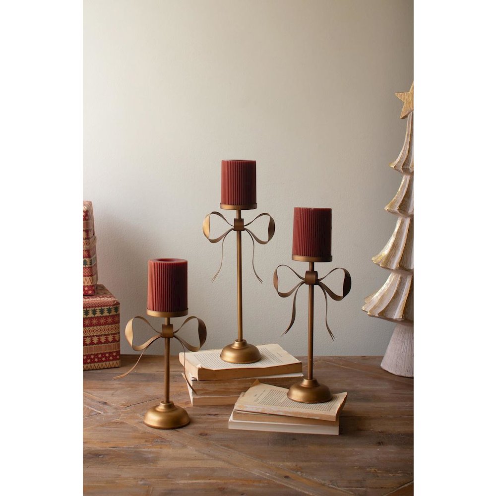 Set Of Three Antique Brass Pillar Candle Stands -Bow Detail. Picture 2