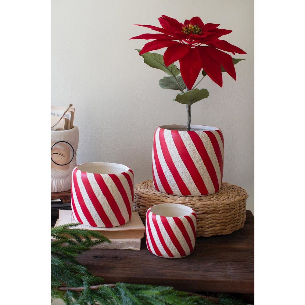 Set Of Three Concrete Candy Cane Planters. Picture 1