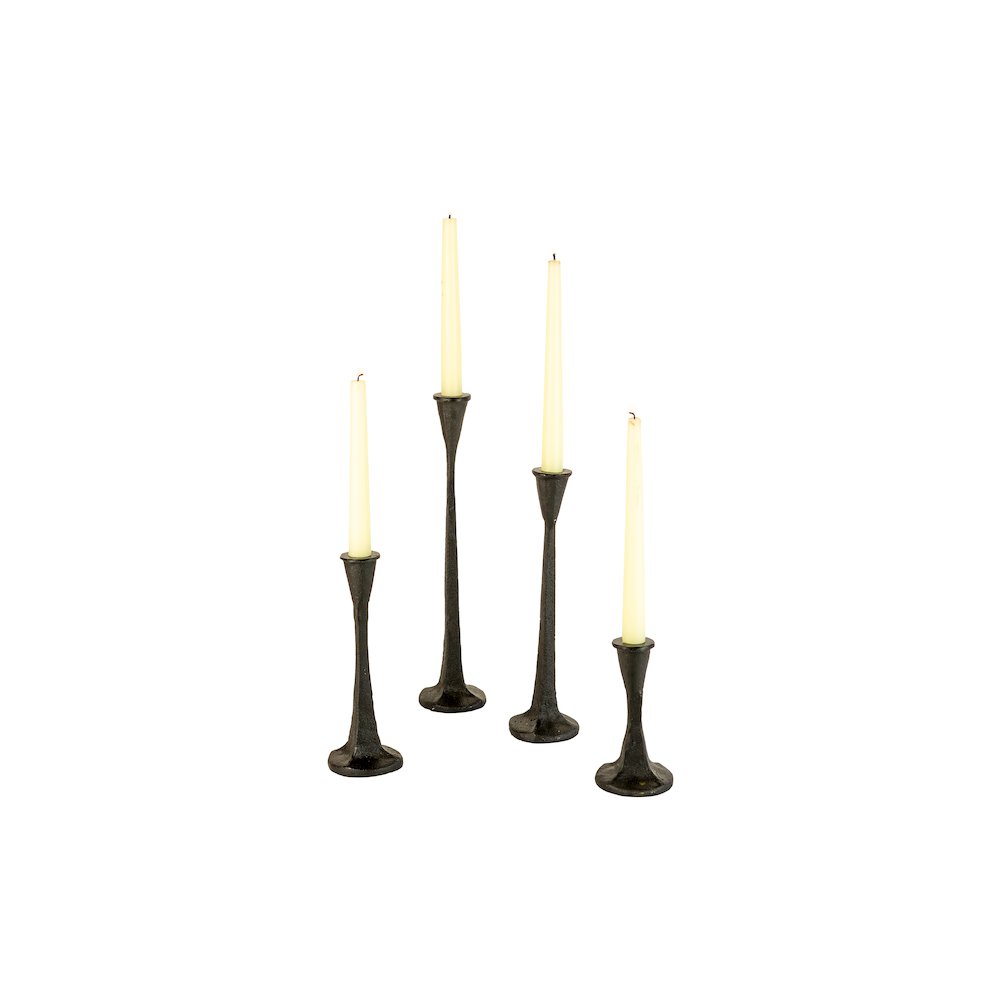 Set Of Four Cast Iron Taper Candle Holders. Picture 1