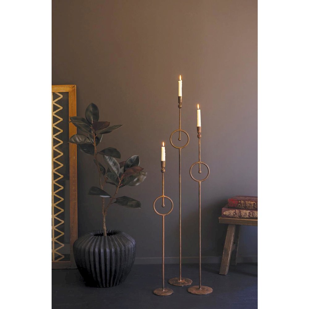 Set Of Three Tall Taper Candle Holder With Circle Detail. Picture 1