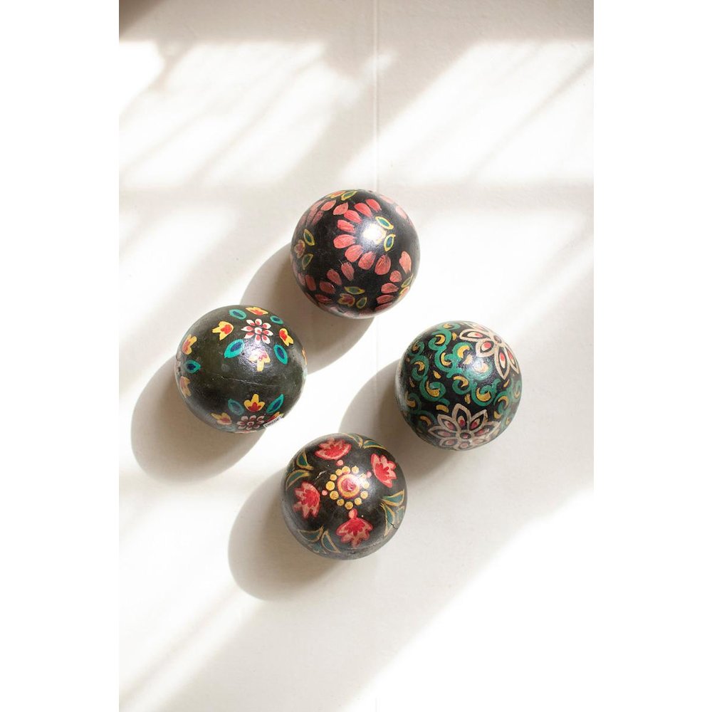 Set Of Four Hand-Painted Wooden Spheres. Picture 1