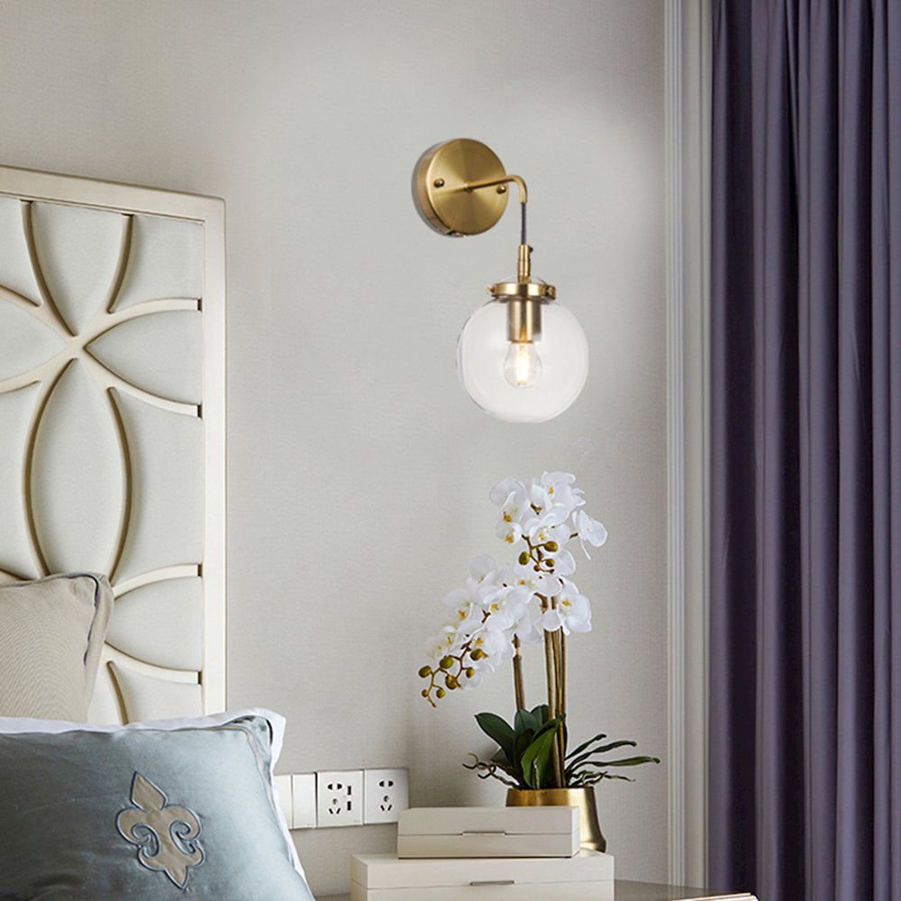 1-Light Brass Wall Sconce With A Clear Glass Globe Shade. Picture 4