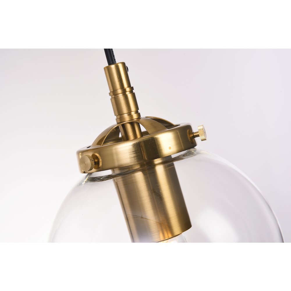 1-Light Brass Wall Sconce With A Clear Glass Globe Shade. Picture 3