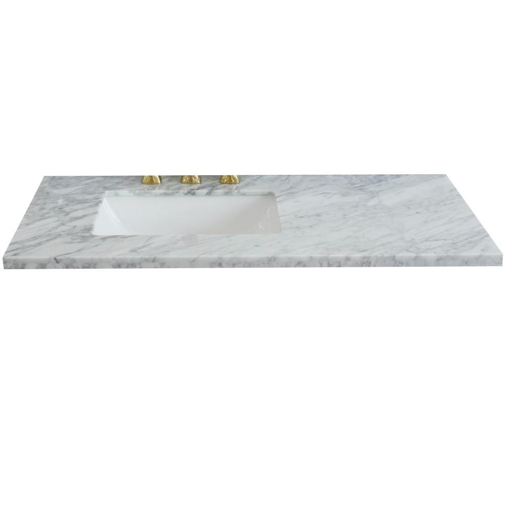 43 White Carrara countertop and single rectangle left sink. Picture 1