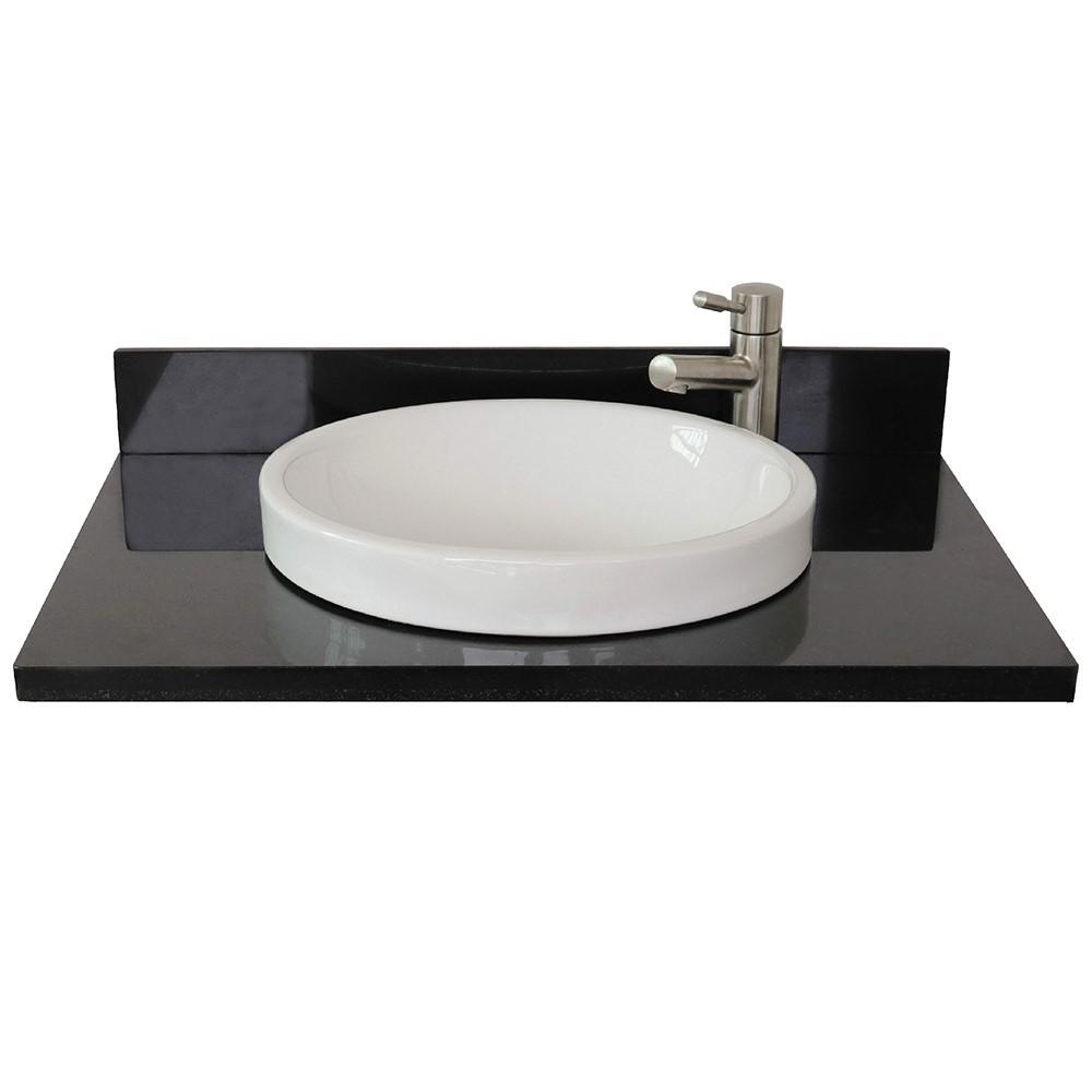 31 Black galaxy granite top with round sink. Picture 4