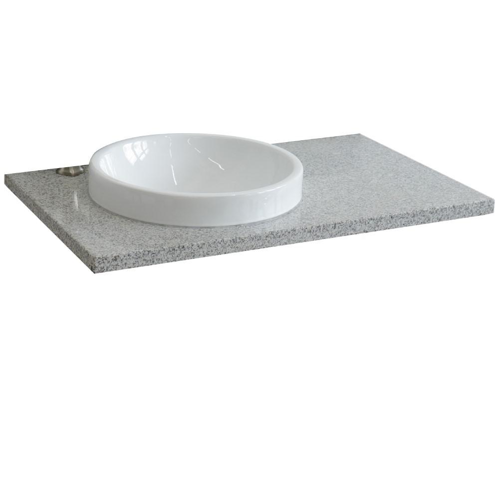 37 Gray granite countertop and single round left sink. Picture 1