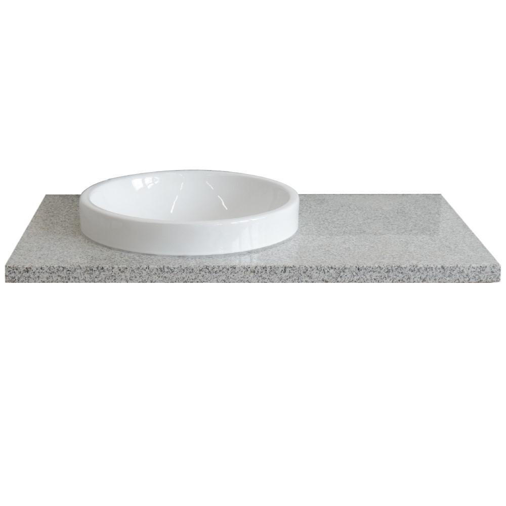 37 Gray granite countertop and single round left sink. Picture 3