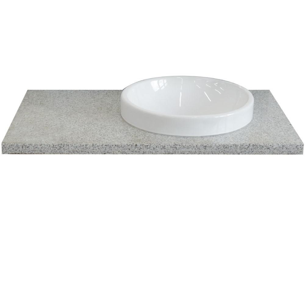 37 Gray granite countertop and single round right sink. Picture 1